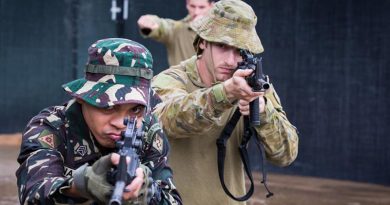 Philippine Army solider Sergeant Sonny Casuga practices urban combat techniques with Australian Army soldiers from the 3rd Brigade, at Capinpin, Philippines, as part of Operation Augury. Photo by Corporal Kyle Jenner.