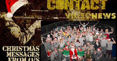 The crew of HMAS Warramunga sing Christmas carols on the flight deck, in the Middle East. Photo by Leading Seaman Tom Gibson.