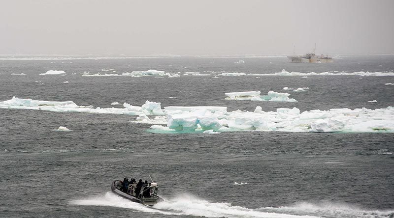 A boarding party from HMNZS Otago approaches a foreign fishing vessel to conduct an inspection as part of Operation Castle, in the Ross Sea. NZDF photo.