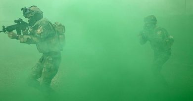 Iraqi Army Rangers storm a building during an Australian-led training activity. Photo by Corporal Steve Duncan.