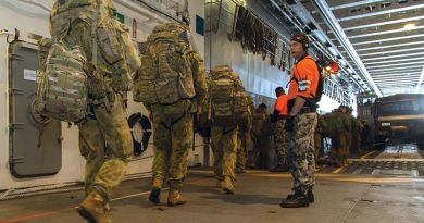 Soldiers from 5 Brigade board one of HMAS Canberra's landing craft as they prepare to leave the ship on completion of Exercise Ocean Raider 2017.
