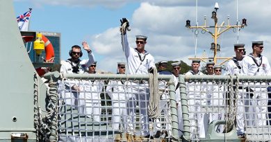 HMAS Newcastle' sailors wave to families as she pulls alongside Garden Island, Sydney after returning home from the Middle East Region. Photo (and caption) by Able Seaman Craig Walton.