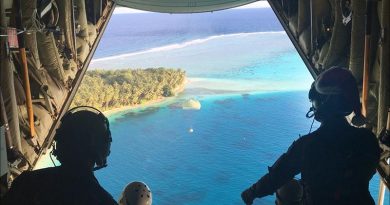 A cardboard container is dispatched from a Royal Australian Air Force C-130J Hercules during Operation Christmas Drop 17. Photo by Eamon Hamilton.