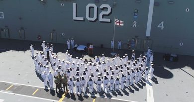 Commander Australian Fleet, Rear Admiral Stuart Mayer addresses a small gathering on-board HMAS Canberra before his handover as Commander, Australian Fleet to friend and colleague Rear Admiral Jonathan Mead. Photo by Able Seaman Tara Byrne.