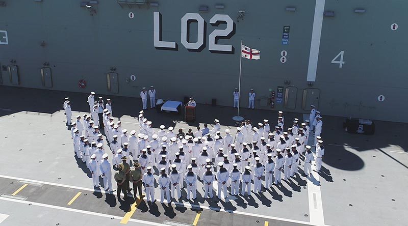 Commander Australian Fleet, Rear Admiral Stuart Mayer addresses a small gathering on-board HMAS Canberra before his handover as Commander, Australian Fleet to friend and colleague Rear Admiral Jonathan Mead. Photo by Able Seaman Tara Byrne.