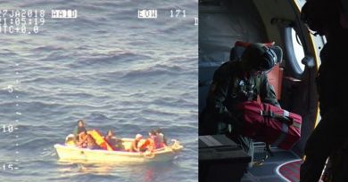 Survivors from a missing ferry in Kiribati are found in a dinghy – and a Royal New Zealand Air Force crewman prepares to drop emergency supplies to them. NZDF photo.