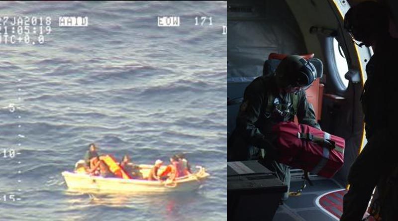 Survivors from a missing ferry in Kiribati are found in a dinghy – and a Royal New Zealand Air Force crewman prepares to drop emergency supplies to them. NZDF photo.