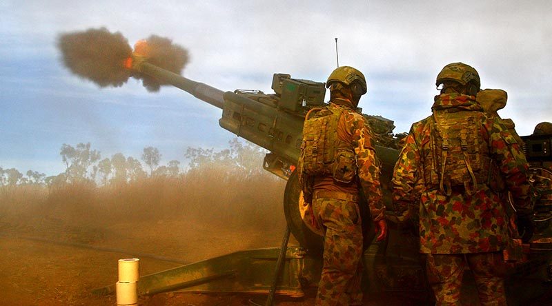Soldiers from Townsville-based 4th Regiment Artillery fire an M777 155mm Howitzer in High Range Training Area. Photo by Brian Hartigan.