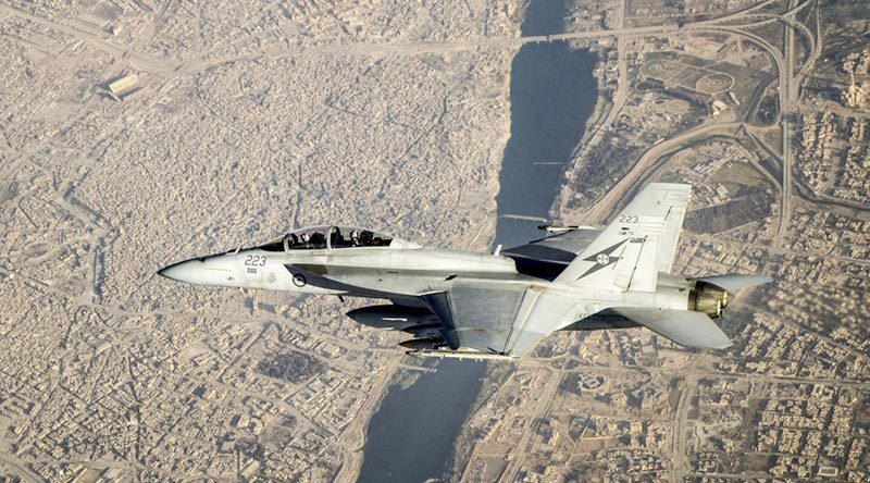 A Royal Australian Air Force F/A-18F Super Hornet flies over Mosul, Iraq, during an Operation Okra mission. Photo by Flight Lieutenant Trent, 12 July 2017.