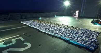 Seized parcels of heroin lay on the flight deck of HMAS Warramunga during an operation in the Western Indian Ocean. Photo by Leading Seaman Tom Gibson.