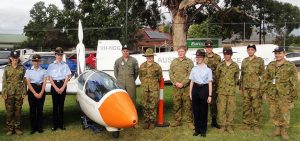 No 602 Squadron cadets on duty at the 2017 Mount Barker Show (left to right): CDT Grace Wilton, LCDT Anita Gardner, CCPL Benjamin Grillett, LCDT Ben Carter, CCPL Erika Gardner, CCPL Blake Harding, CDT Bianca Willsmore, LCDT Aiden Carling, CDT Lachlan Willsmore, CDT Kyle Bratkovic and CCPL Olivia Gardner. The ASK-21 Mi two-seater club glider is displayed with the propeller assembly raised to support self-launch or sustained flight.