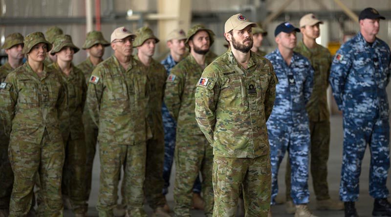 ADF personnel on parade during a change-of-command ceremony of Joint Task Force 633 in the Middle East from Major General John Frewen to Rear Admiral Jaimie Hatcher, on 20 January 2018. Photo by WO2 Neil Ruskin.