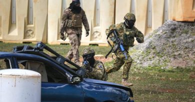 Personnel from No. 2 Security Forces Squadron, USAF and the Japanese Self Defence Force cross train in security tactics for Exercise Cope North 2018, Andersen Air Force Base Guam. Photo by Corporal Glen McCarthy.