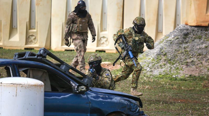 Personnel from No. 2 Security Forces Squadron, USAF and the Japanese Self Defence Force cross train in security tactics for Exercise Cope North 2018, Andersen Air Force Base Guam. Photo by Corporal Glen McCarthy.
