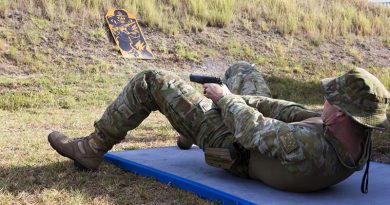 A RAAF Officer practices alternate firing positions with a pistol as part of the ISET-Tactical training aimed at improving his individual combat skills. Photos by Sergeant Amanda Campbell.
