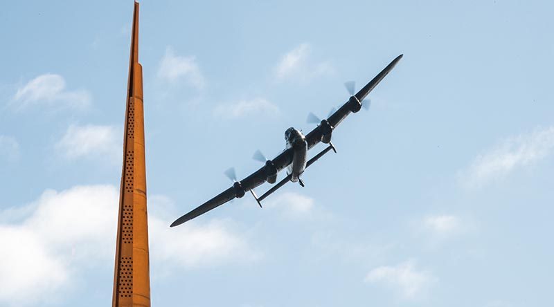 BBMF Lancaster over Memorial Spire November 2015. International Bomber Command Centre official photo.