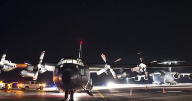 A Royal New Zealand Air Force C-130 Hercules in front of a Royal Australian Air Force C-17 Globemaster at Fuaamotu International Airport, Tonga. NZDF photo.