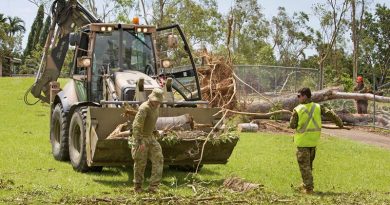 Members of 1st Combat Engineer Regiment from 1st Brigade, Darwin clean up Wulagi Primary School after Cyclone Marcus. Photo by Leading Seaman James Whittle.