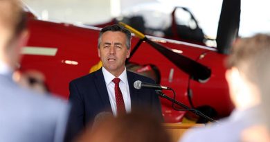 Darren Chester addresses invited guests during a ceremony at RAAF Base East Sale. Photo by Corporal Veronica O'Hara.