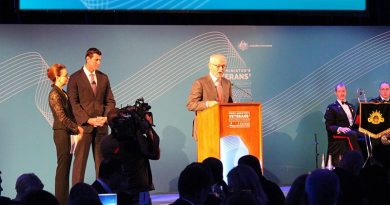 Prime Minister Malcolm Turnbull address guests at the inaugural Prime Minister's Veterans' Employment Awards, watched by Virginia Hausegger and Ben Roberts-Smith VC.