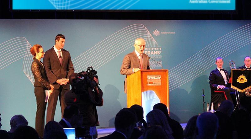 Prime Minister Malcolm Turnbull address guests at the inaugural Prime Minister's Veterans' Employment Awards, watched by Virginia Hausegger and Ben Roberts-Smith VC.