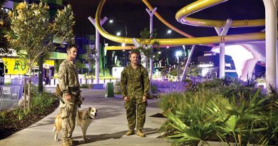 New Zealand Army Explosive Detection Dog Handler Acting Corporal Thomas Hynes (left) along with Australian Army 2nd Combat Engineer Regiment Sapper Guy Phillips, walk through the Athlete’s Village, during a search of the venue for the 2018 Gold Coast Commonwealth Games. ADF photo.