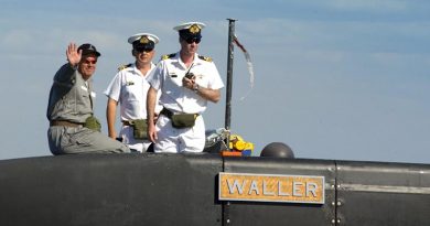 FILE PHOTO: Then Senator David Johnston (left) on board the Australian Submarine Corporation-built Collins-class submarine HMAS Waller. Photo by Petty Officer Steve Coates.