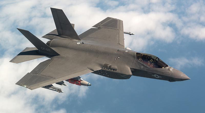 CF-02 Flt 596 piloted by Peter Wilson flies the final System Development and Demonstration (SDD) test flight for the F-35 program. Photo by Lockheed Martin.