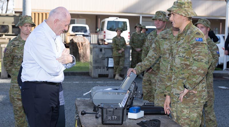 Australian soldier Sapper N Field of the 2nd Combat Engineer Regiment discusses search equipment with Governor-General Sir Peter Cosgrove and Lady Cosgrove at the Southport Army Depot. Photo by Sergeant David Hicks.