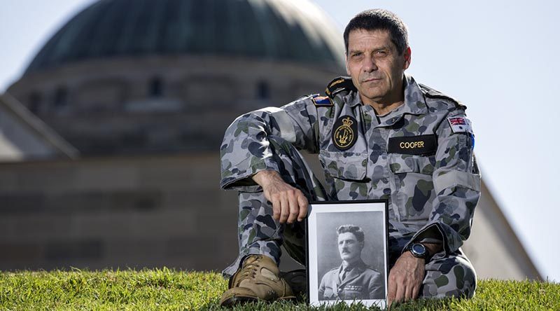 Royal Australian Navy Able Seaman Norman Cooper with a picture of his ancestor, Henry William 'Harry' Murray, VC, CMG, DSO and Bar, DCM, at the Australian War Memorial before going to Gallipoli for ANZAC Day 2018. Photo by Leading Seaman Jake Badior.