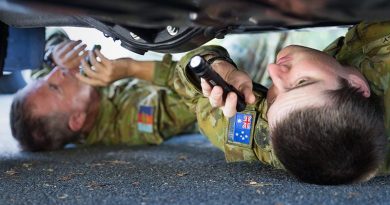 Australia Army Reserve soldiers Privates Zac Kelly (right) and Tony Duffy from 11 Brigade check underneath a vehicle during search training at Kokoda Barracks in preparation to support the security of the 2018 Gold Coast Commonwealth Games. Photo by Corporal Kyle Genner.