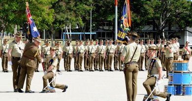 Governor General of Australia Sir Peter Cosgrove presents new Regimental and Queens Colours to the 1st Battalion, Royal Australian Regiment. Photo by Major Al Green.