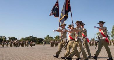 Soldiers from 1st Battalion, Royal Australian Regiment, parade the battalion Colours during Vietnam Week commemorations at Lavarack Barracks, Townsville (2016). Photo by Corporal Kyle Genner.