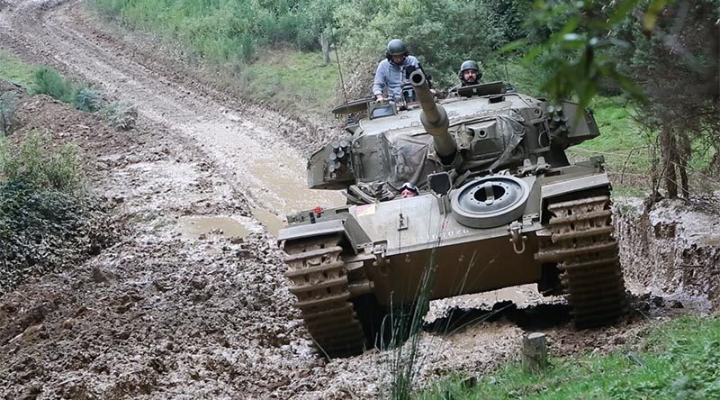 A ex-Australian Army Centurion tank bush bashing at South Gippsland Tank Adventures, to promote the tank's launch inside the global PC game World of Tanks. Photo by Brian Hartigan.