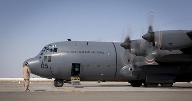 Royal New Zealand Air Force loadmaster Sergeant Dave Wood observes start-up procedures on an RNZAF C-130 in the Middle East.