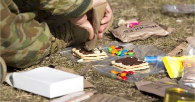 An Australian Army staff cadet from Royal Military College, Duntroon, combines some ingredients during a lecture on ration packs at the Majura training area. Photo by Corporal Bill Solomou.