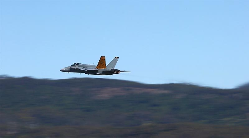 F/A-18A 'Classic' Hornet makes a low-level pass over Illawarra Regional Airport during the 2018 Wings Over Illawarra Air Show. Photo by Brian Hartigan.
