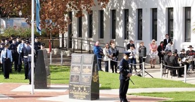 The Ensign Orderly from No 6 Wing, AAFC in position in front of the contingent from No 462 Squadron, RAAF, at a Bomber Command Commemoration Service at Torrens Parade Ground in Adelaide. Photo by Flying Officer (AAFC) Paul Rosenzweig.