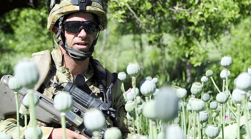 Bombardier Kelvin Groves from the First Mentoring Task Force on patrol in Baluchi Valley, Afghanistan. Photo by Sergeant Mick Davis.