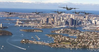 A formation of C-130J Hercules fly over Sydney Harbour to mark the 75th Anniversary of No. 37 Squadron. Photo by Corporal David Gibbs.