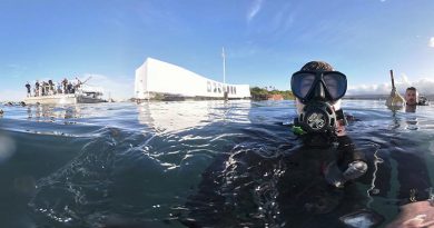 Royal Australian Navy sailor Able Seaman Clearance Diver Benjamin Johnson grabs a selfie before diving on the USS Arizona Memorial site in Pearl Harbor, Hawaii, during RIMPAC 2018. Photo by Able Seaman Benjamin Johnson.