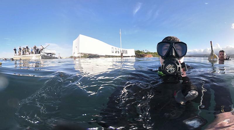 Royal Australian Navy sailor Able Seaman Clearance Diver Benjamin Johnson grabs a selfie before diving on the USS Arizona Memorial site in Pearl Harbor, Hawaii, during RIMPAC 2018. Photo by Able Seaman Benjamin Johnson.