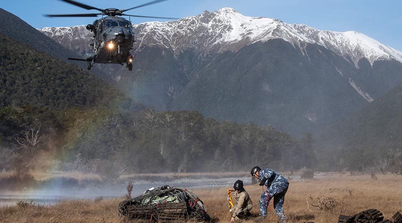 Personnel from the New Zealand Army’s 5 Movements Company and the Royal New Zealand Air Force’s No.3 Squadron remove debris from Travers Valley in Nelson Lakes National Park, in support of the Department of Conservation. NZDF photo.