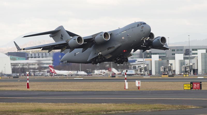 A RAAF C-17A Globemaster takes off from Canberra Airport to take the first tranche of Australian personnel and equipment to Thailand to assist in the international search-and-rescue effort for children missing at a cave complex in Chiang Rai. Photo by Sergeant Ray Vance.