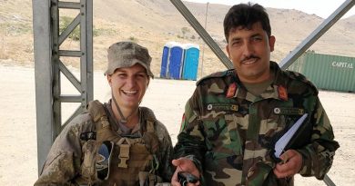 Captain Demi Exley and and un-named Afghan mentee at Camp Qargha, Afghanistan. NZDF photo.