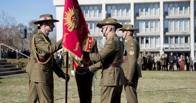 Outgoing Chief of Army Lieutenant General Angus Campbell passes the Army Banner to incoming Chief of Army Lieutenant General Rick Burr during a Chief of Army handover parade at Russell Offices in Canberra. Photo by Grace Costa Banson.