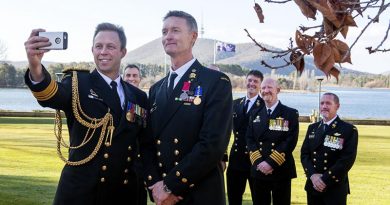 Chief of Navy Vice Admiral Michael Noonan takes a selfie with Chief Petty Officer Troy Eather at Government House, Canberra, after the presentation of bravery medals and awards for Australian Thai cave rescuers. Photo by Lieutenant Tony Martin.