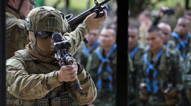 Australian Army soldiers from the 1st Battalion, Royal Australian Regiment, demonstrate room-clearance drills to members of the Royal Thai Army during Exercise Chapel Gold 2018, Chiang Mai Province, Thailand. Photo by Corporal Matthew Bickerton.