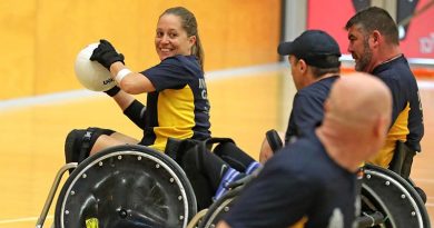 Australian Invictus Games 2018 team member Trudi Lines prepares to pass during a wheelchair rugby exhibition match with RSLWA, in Perth. Photo by Leading Seaman Jason Tufrey