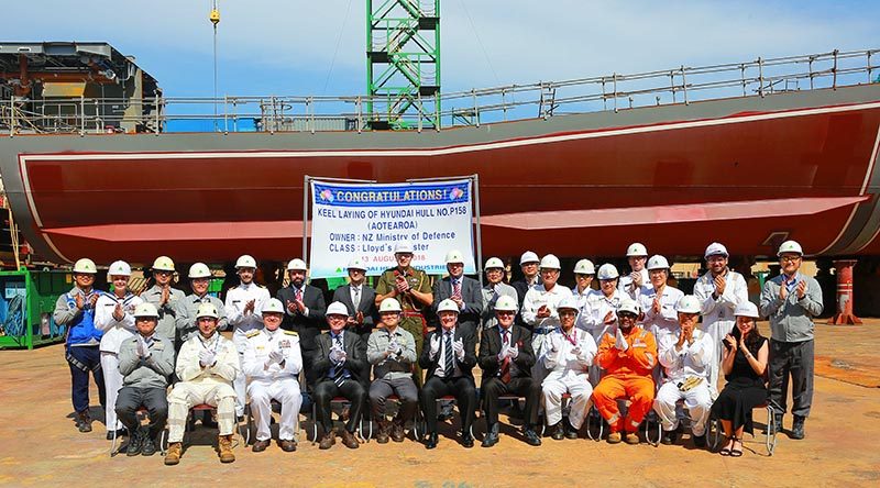 New Zealand Ambassador to South Korea Phillip Turner (front row, fourth from left) joins representatives of the Royal New Zealand Navy, New Zealand Defence Force, Ministry of Defence, Hyundai shipyard and Lloyds of London in celebrating the keel laying of the future HMNZS Aotearoa. Photo supplied by NZDF.